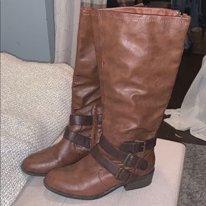Barely worn brown riding boots with buckle accents